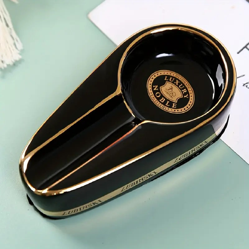 Black and gold decorative item with 'Luxury Noble' branding on a light green surface.