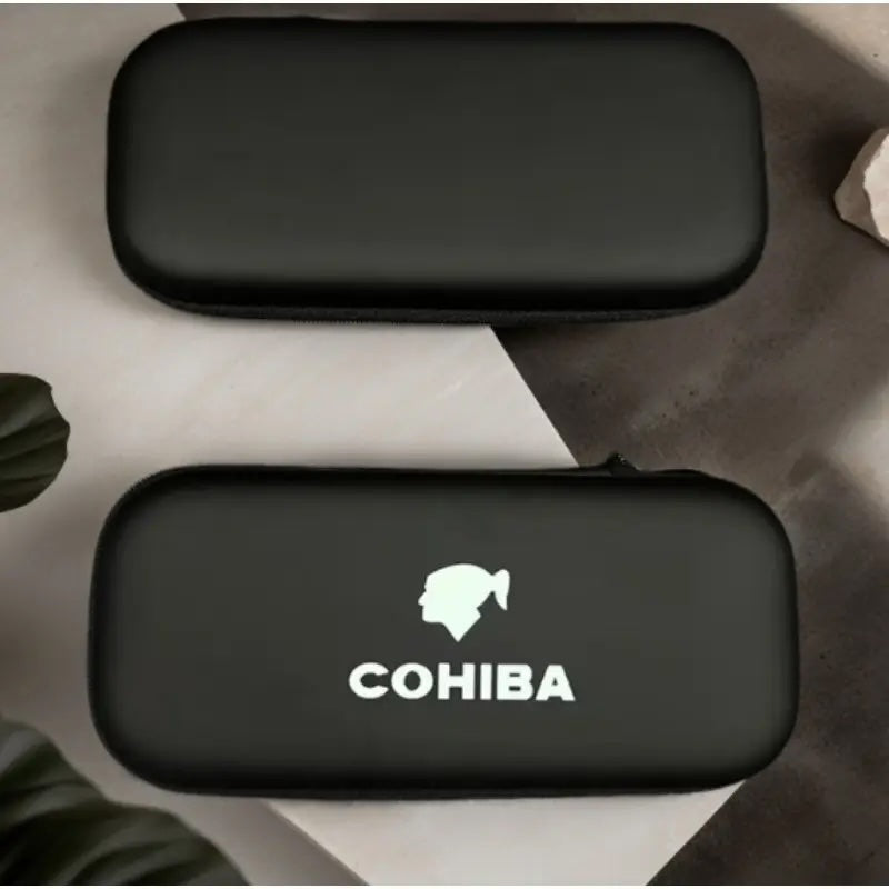 Black Cohiba case on a textured surface