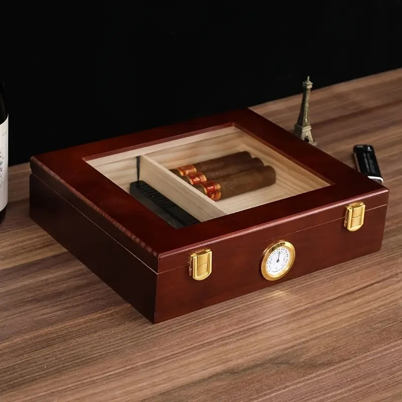 Wooden humidor with cigars on a wooden surface