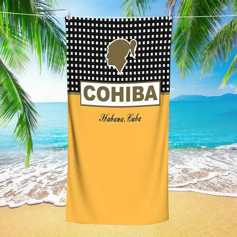 Towel with Cohiba logo on a beach background